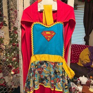 Super Girl Apron Styled outfit with matching super girl socks